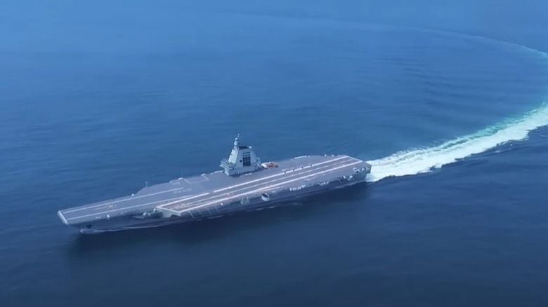 China's latest aircraft carrier, the Fujian, on its maiden voyage