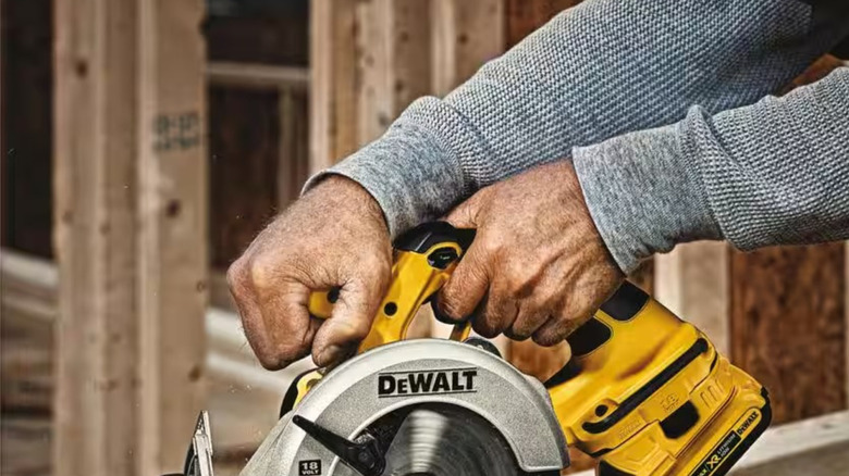 DeWalt power tool with 20V battery and battery adapter