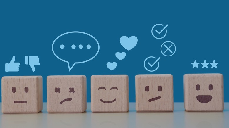 Customer ratings represented by cardboard boxes.