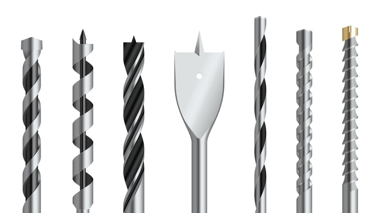 A selection of drill bits designed to cut different materials.