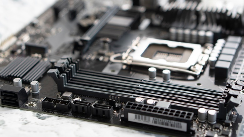 A close-up of a black motherboard