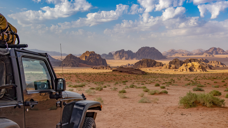 Truck driving in ruged landscape