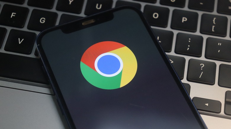 Smartphone Chrome logo on laptop