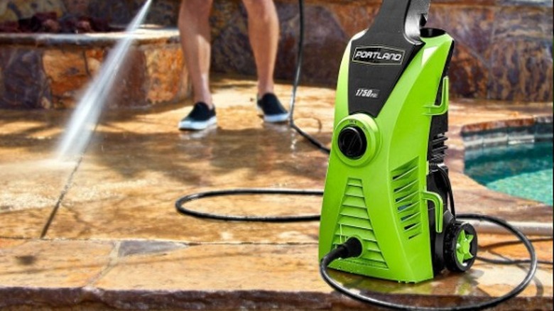Person using Portland pressure washer