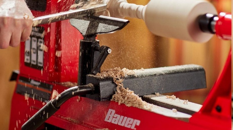Close up of carpenter turning wood on Bauer lathe