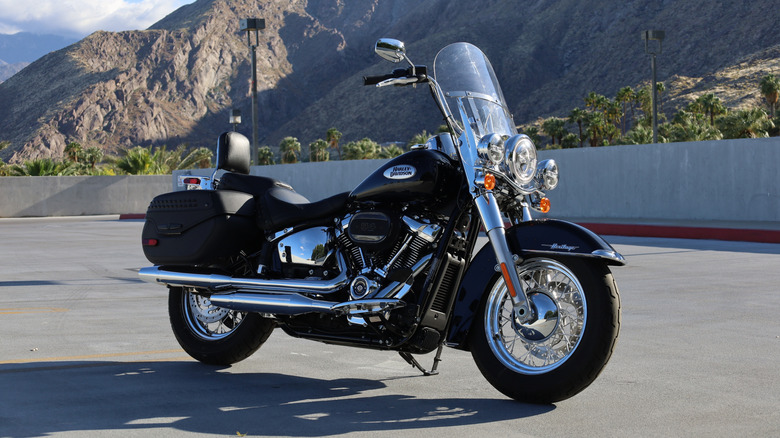 Harley-Davidson Softail parked in front of mountains
