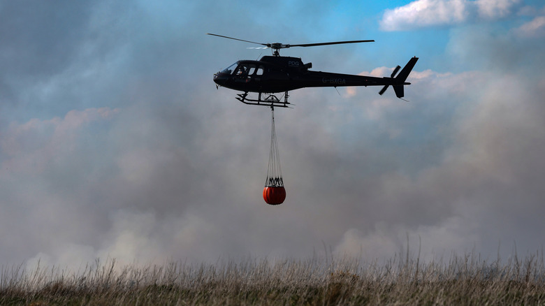 Helicopter fighting fires