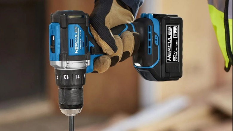 Person using a Hercules 20V drill driver
