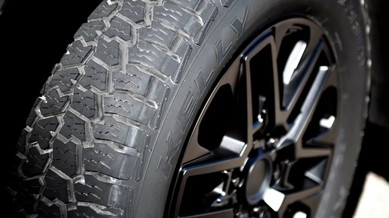 A close-up of a Kelly tire on a vehicle.