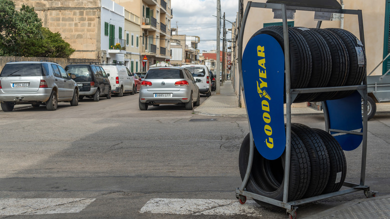 A display of Goodyear tires at a retail store in a European city.
