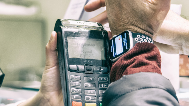 Man paying with Apple Watch