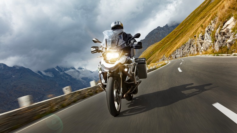 motorcycle on road at dramatic angle