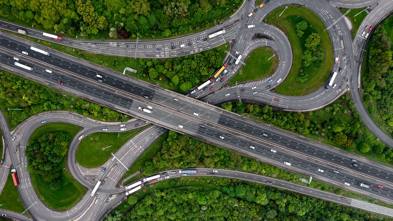 Aerial view directly above a busy M62 UK motorway intersection
