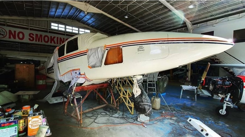 a Piper Aztec being worked on in an MRO