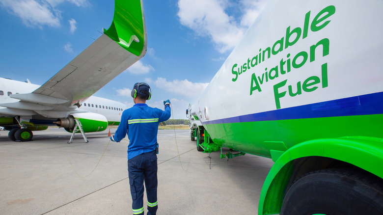 Sustainable Aviation Fuel truck refueling an airplane