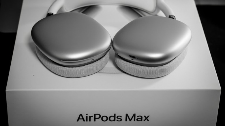 AirPods Max on top of their product box