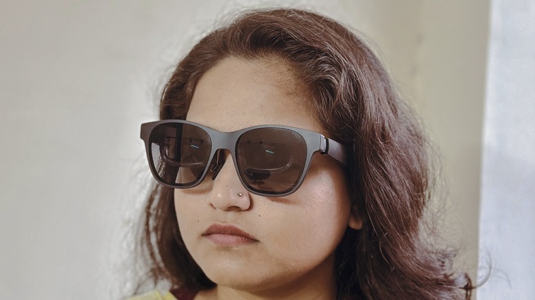 Person wearing smart glasses.