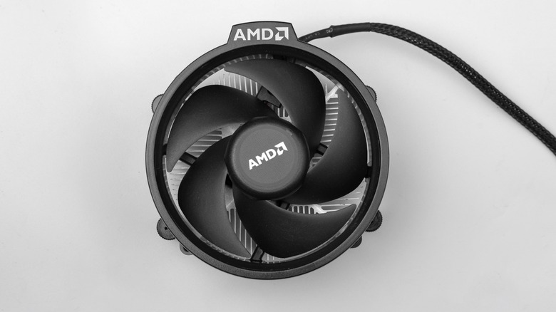 Black AMD Wraith Stealth cooler on a gray background