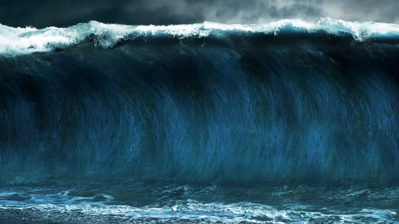 Rendering of a Tsunami stormy sea waves with a thunderstorm background.