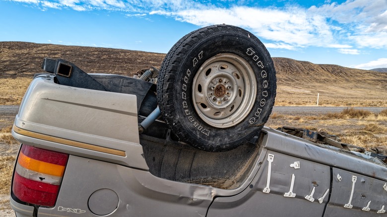 A Large SUV That Rolled Over In The Desert