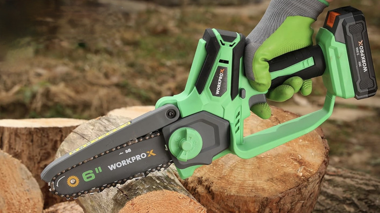 Person using WORKPROX USB chainsaw