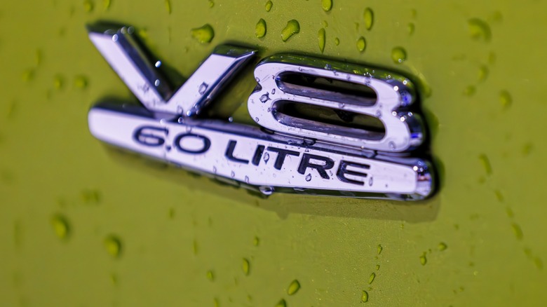 A v8 engine badge on a vehicle.