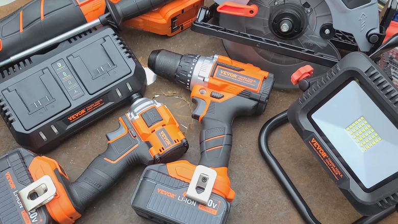 Vevor drills and other tools on a table.