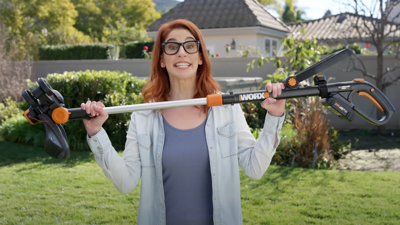 Woman holding Worx edger