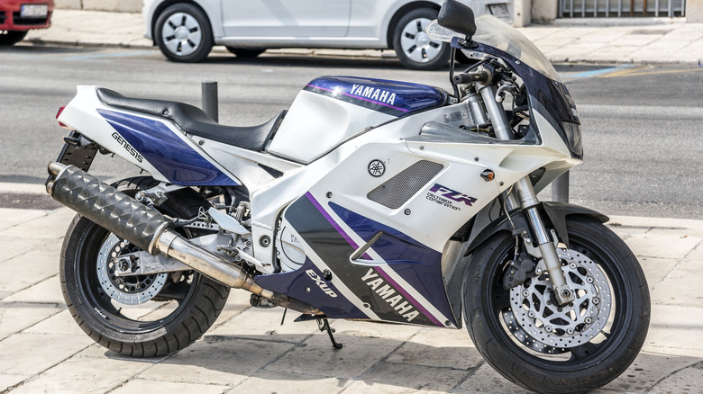 Yamaha motorcycle parked on curb