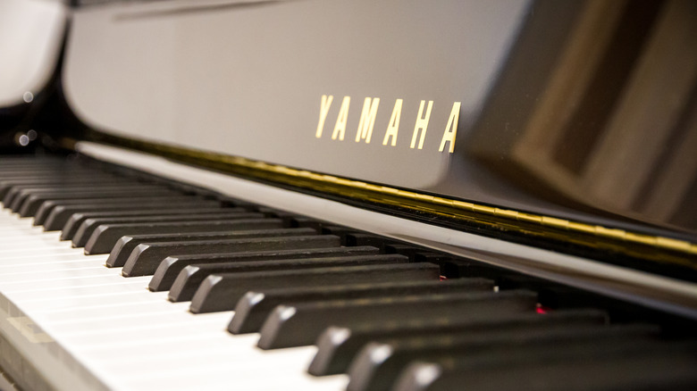 Yamaha text logo on a musical piano