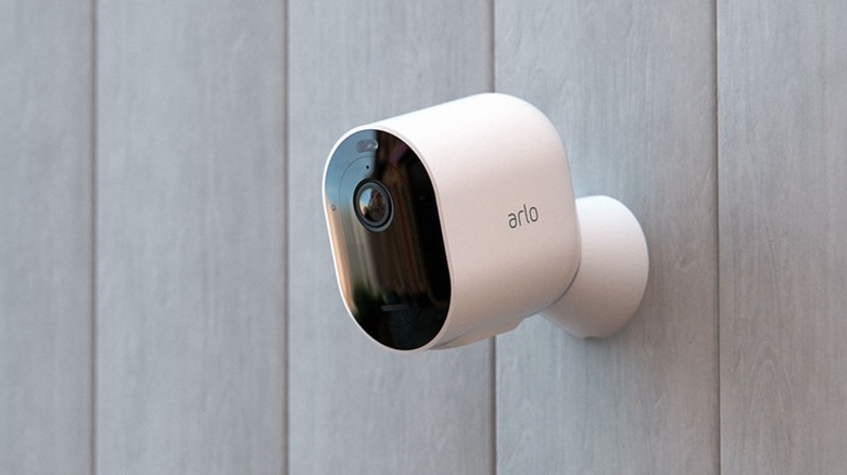 Arlo wireless camera mounted on wall