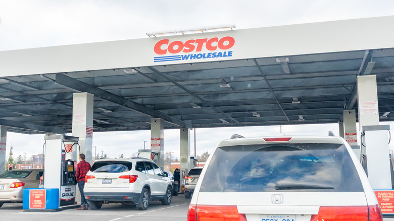 Cars at a Costco gas station.