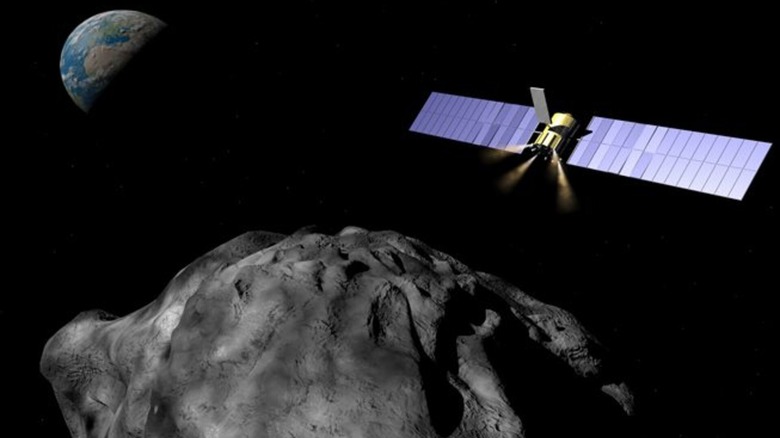Illustration of gravity tractor and astroid