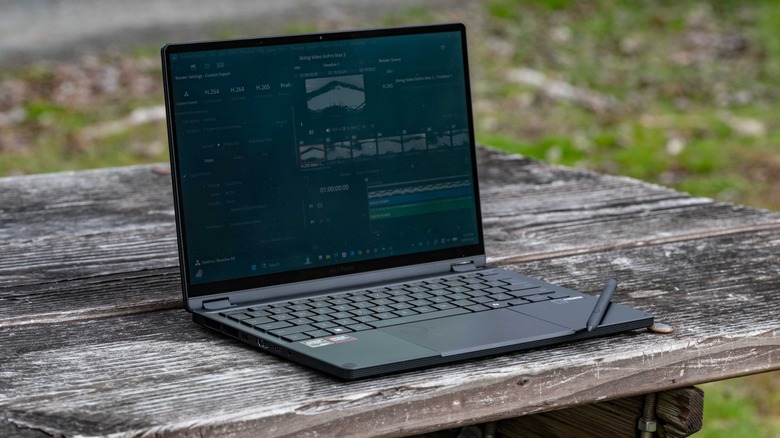 The ASUS GoPro edition laptop on top of picnic table.