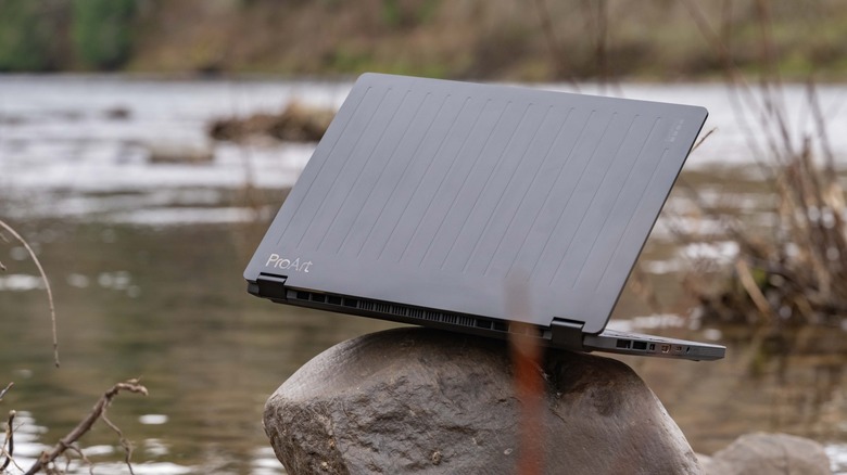 ASUS GoPro Laptop balanced on a rock.