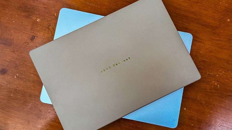 Asus ZenBook A14 atop the MacBook Air