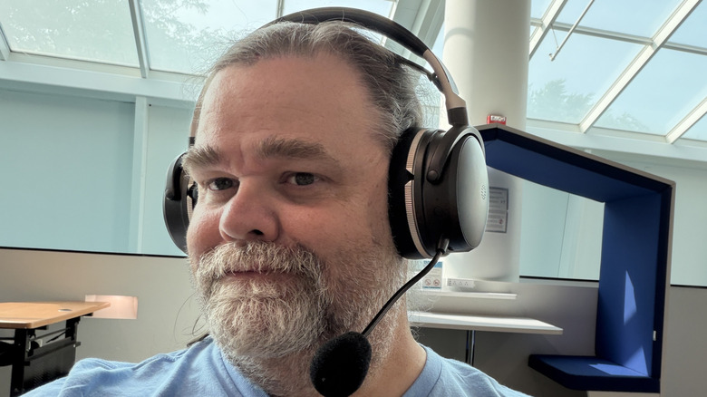 Man wearing the Maxwell 2 ANC Headphones