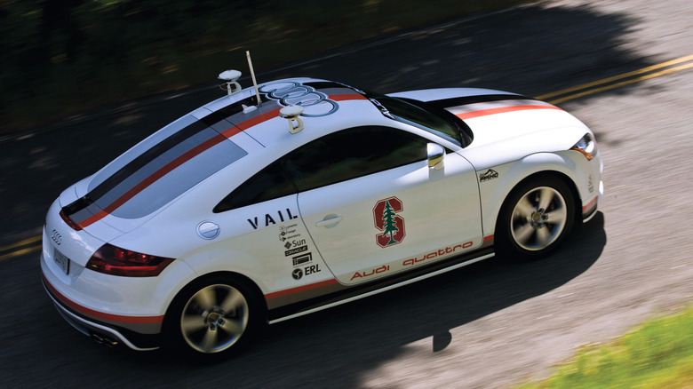 The Audi TTS Pikes Peak climbing up the road