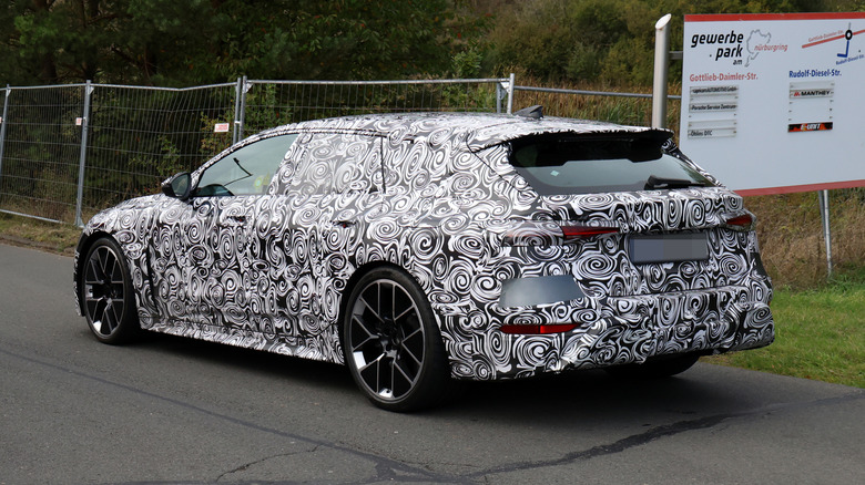 Audi e-tron wagon testing, rear 3/4 view, Nurburgring map on the right