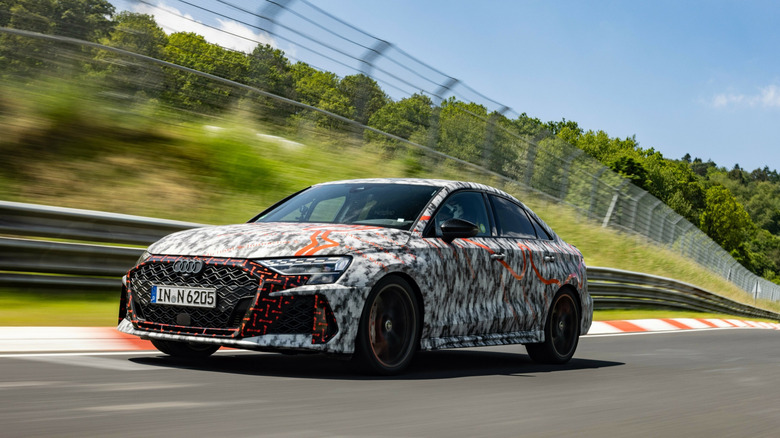 Front 3/4 view of Audi RS3 setting record lap on Nürburgring-Nordschleife track