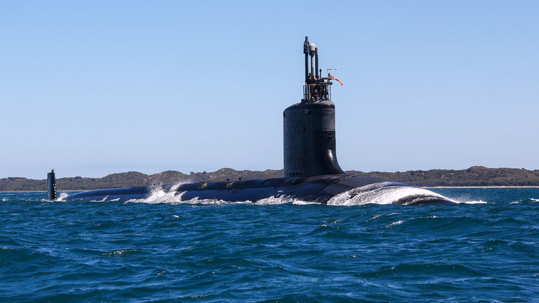 Submarine sailing on ocean surface