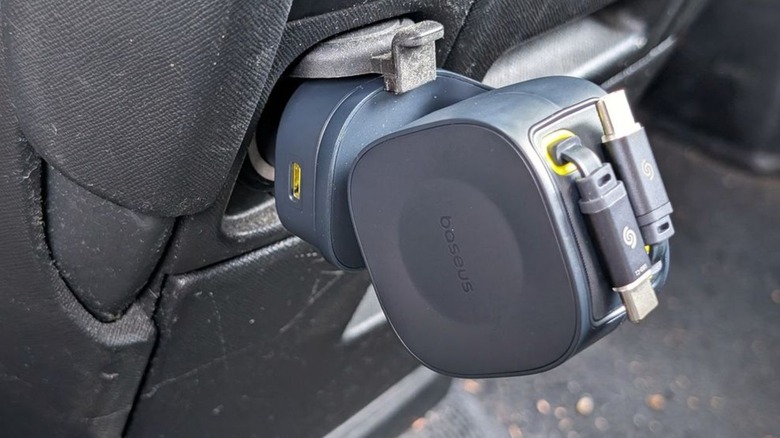 Baseus PrimeTrip VR2 Max  in car port with the head tilted vertically.