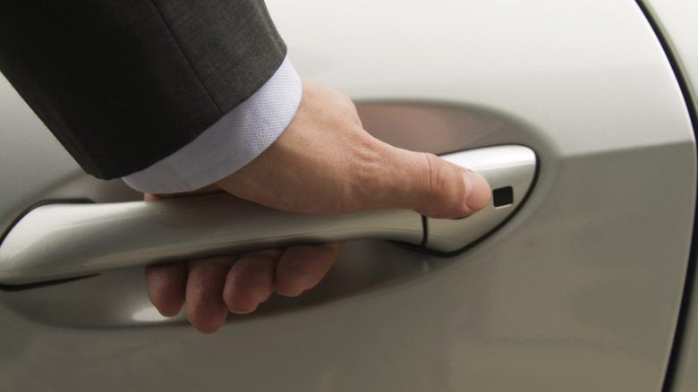 hand on door handle