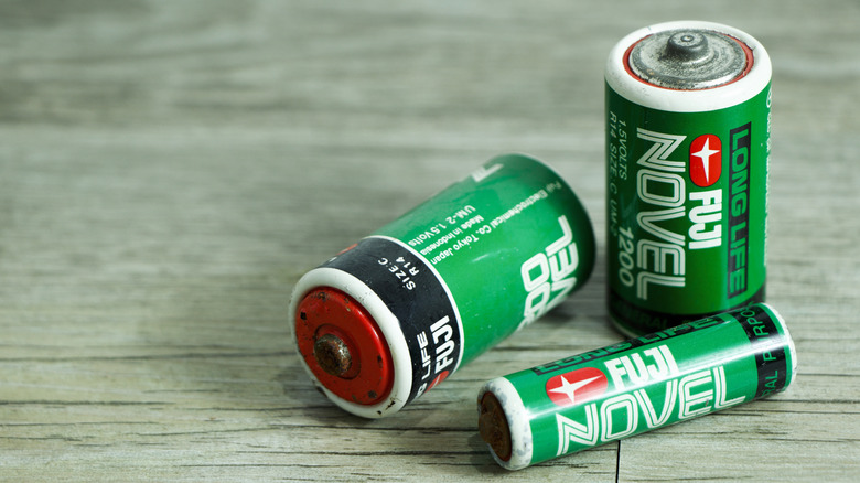 Fuji batteries on a wooden table