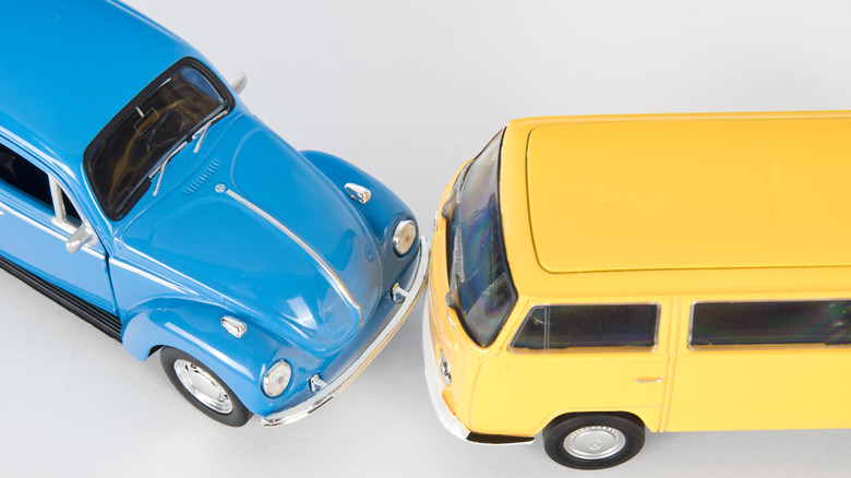Volkswagen beetle and bus toys colliding