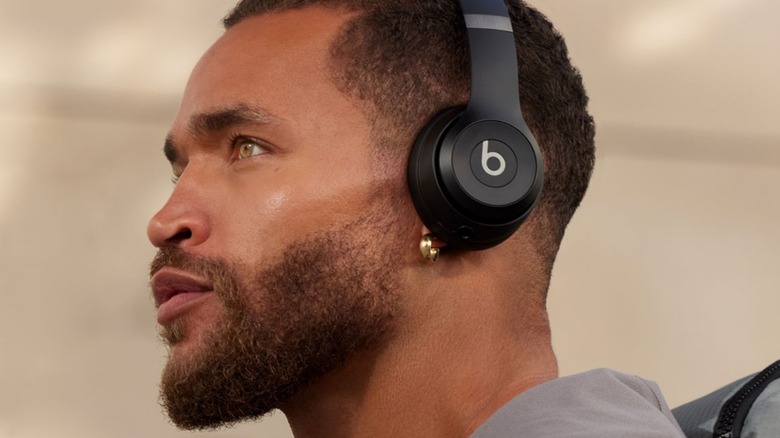 Man wearing Beats Solo 4 headphones