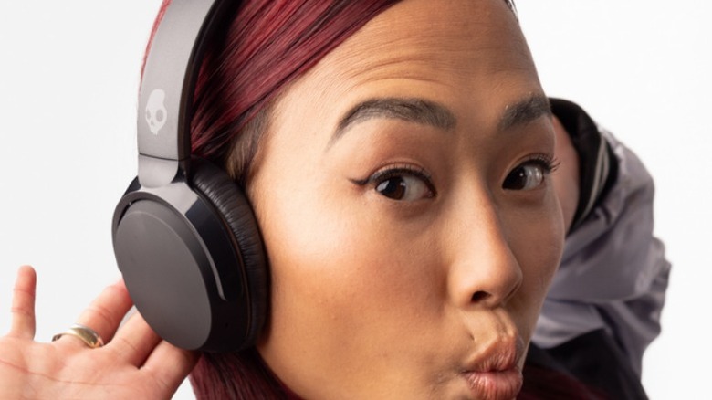 Woman wearing Skullcandy Riff Wireless 2 headphones