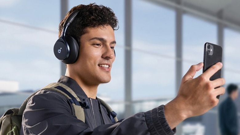 Man wearing Soundcore Space One headphones