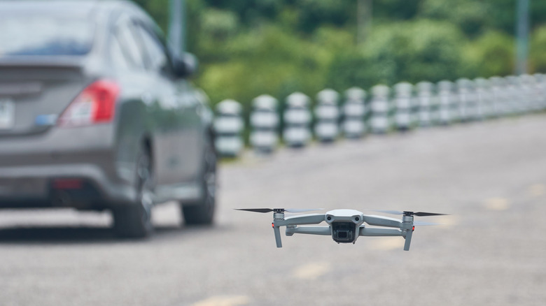 An automated drone following a car