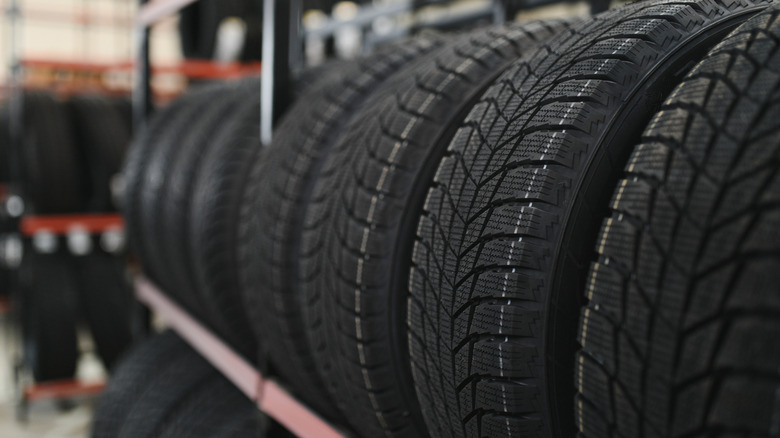 tires on storage rack in a store